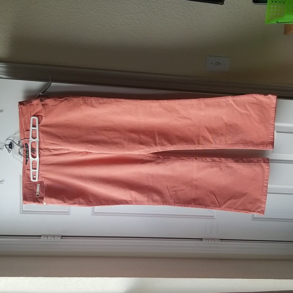 Coral corduroy jeans.